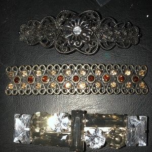 Three decorative hair barrettes